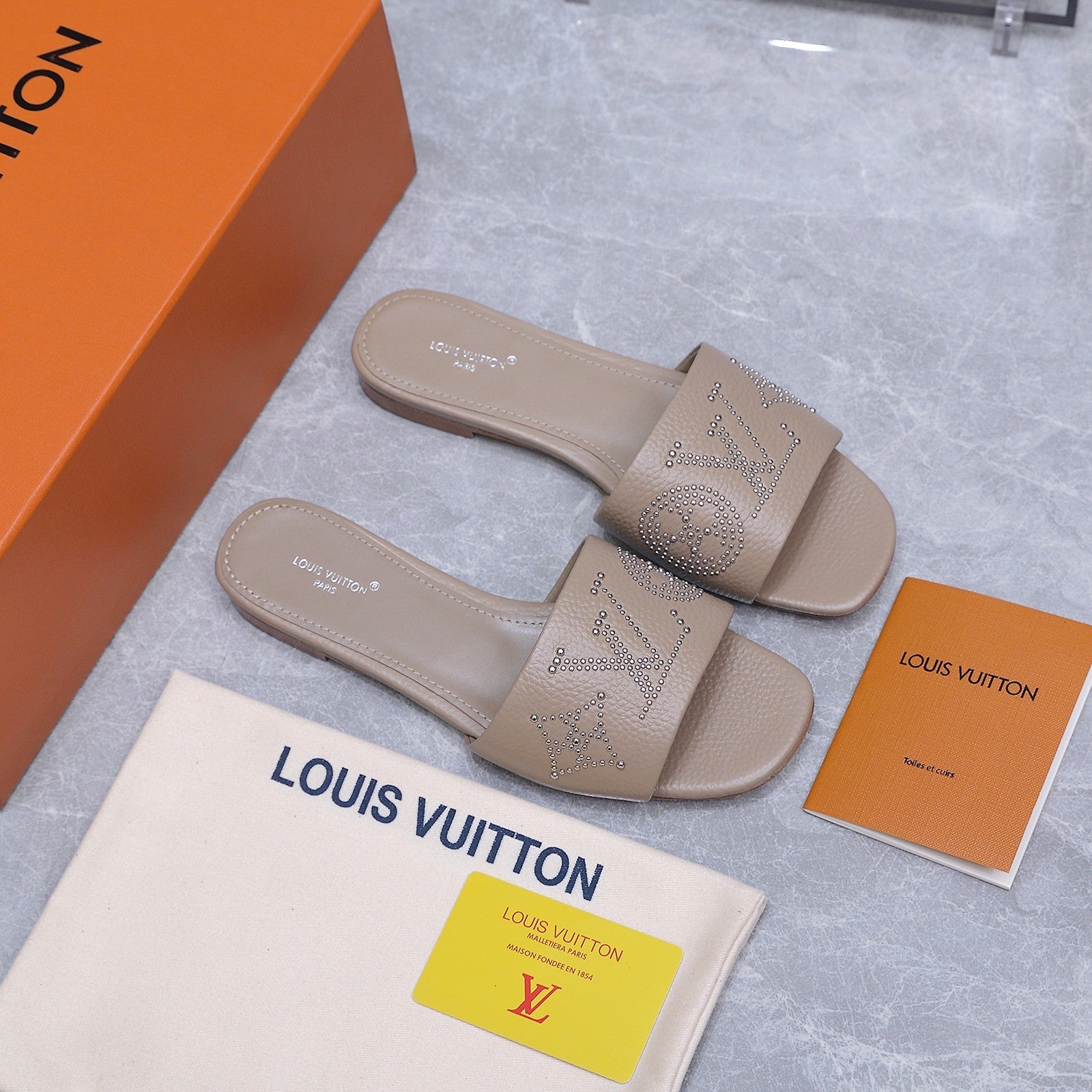 LV 26S FLAT SLIDE SANDALS IN NUDE BROWN CALFSKIN