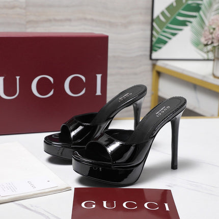 GUCCI 26S HEELED SLIDE SANDALS 120MM IN BLACK PATENT CALFSKIN