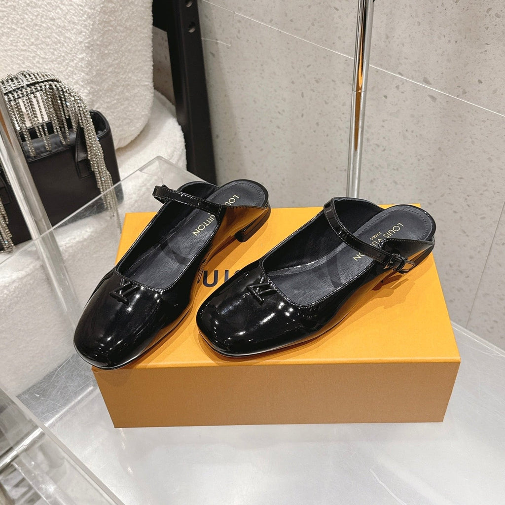 LV 26S FLAT MULES IN BLACK PATENT CALFSKIN