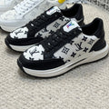 LV TRAINERS IN BLACK CALFSKIN AND WHITE JACQUARD