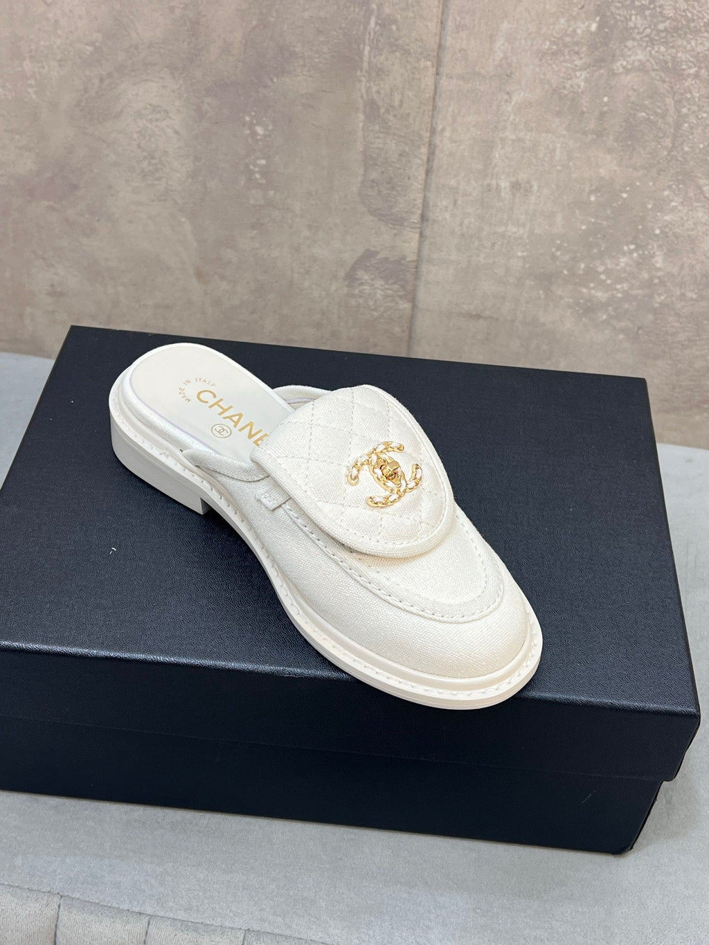 CHANEL 26S MULE LOAFERS IN WHITE CANVAS WITH QUILTED FLAP & CC LOGO