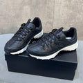 CHANEL 26S RUNNER CC LOGO SNEAKERS IN BLACK CALFSKIN