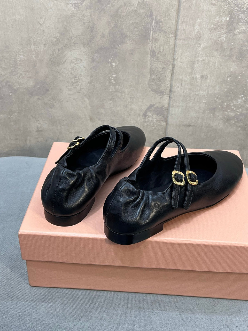 MIUMIU 26S DOUBLE STRAP MARY JANE FLATS IN BLACK SHEEPSKIN