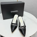 CC HEEL MULES 25S IN BLACK MESH FABRIC AND LAMBSKIN WITH BOW