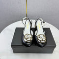CHANEL 26S CAMELLIA PEARL SLINGBACKS IN BLACK CALFSKIN