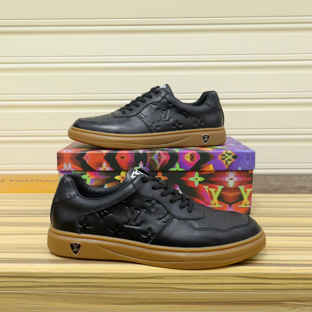 LV TRAINERS IN BLACK CALFSKIN AND BROWN RUBBER
