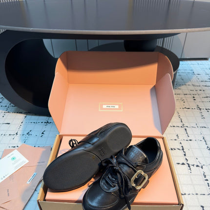 MIUMIU 26S LACE UP SNEAKERS IN BLACK CALFSKIN BUCKLE STRAP DETAIL