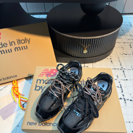 MIUMIU 26S RUNNING SNEAKERS IN BLACK CALFSKIN AND MESH RUBBER SOLE