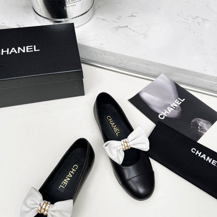 CHANEL 25S MARY JANES IN BLACK CALFSKIN WITH WHITE BOW GOLD HARDWARE