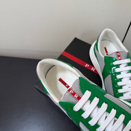 PRADA 26S SNEAKERS IN GREEN PATENT CALFSKIN AND WHITE MESH