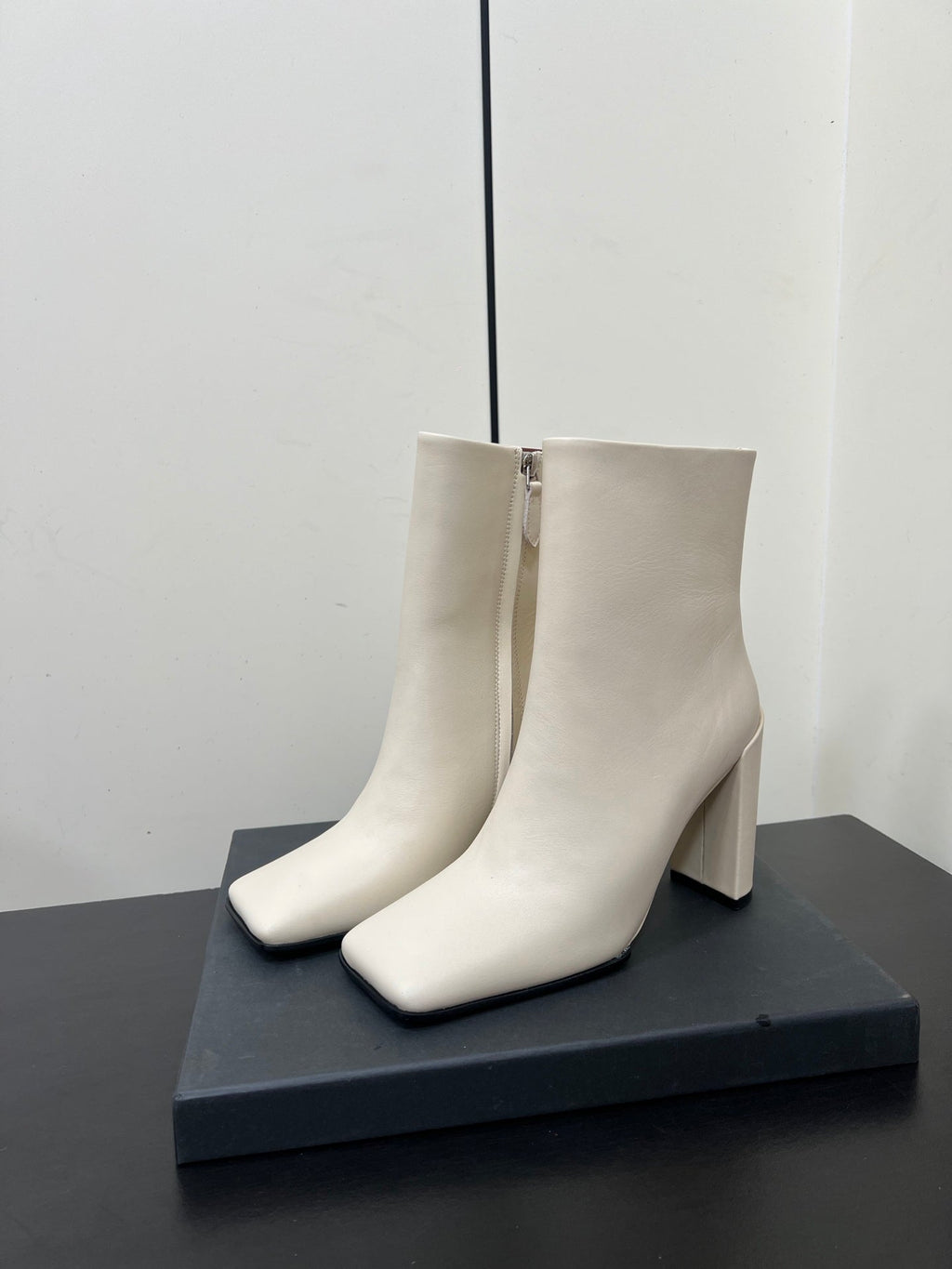 ALAIA 26S SQUARE-TOE BOOTS IN WHITE CALFSKIN