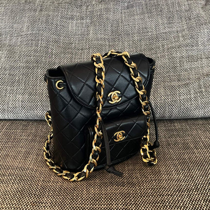 CHANEL 26S BACKPACK WITH FRONT POCKET 21 IN BLACK QUILTED LAMBSKIN GOLD HARDWARE