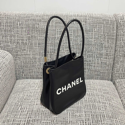 CHANEL 26S LOGO SHOPPING TOTE BAG 25 IN BLACK AND WHITE CALFSKIN GOLD HARDWARE
