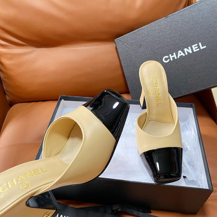 CHANEL 26S HIGH-HEEL MULES 90 MM IN BLACK AND BEIGE LAMBSKIN