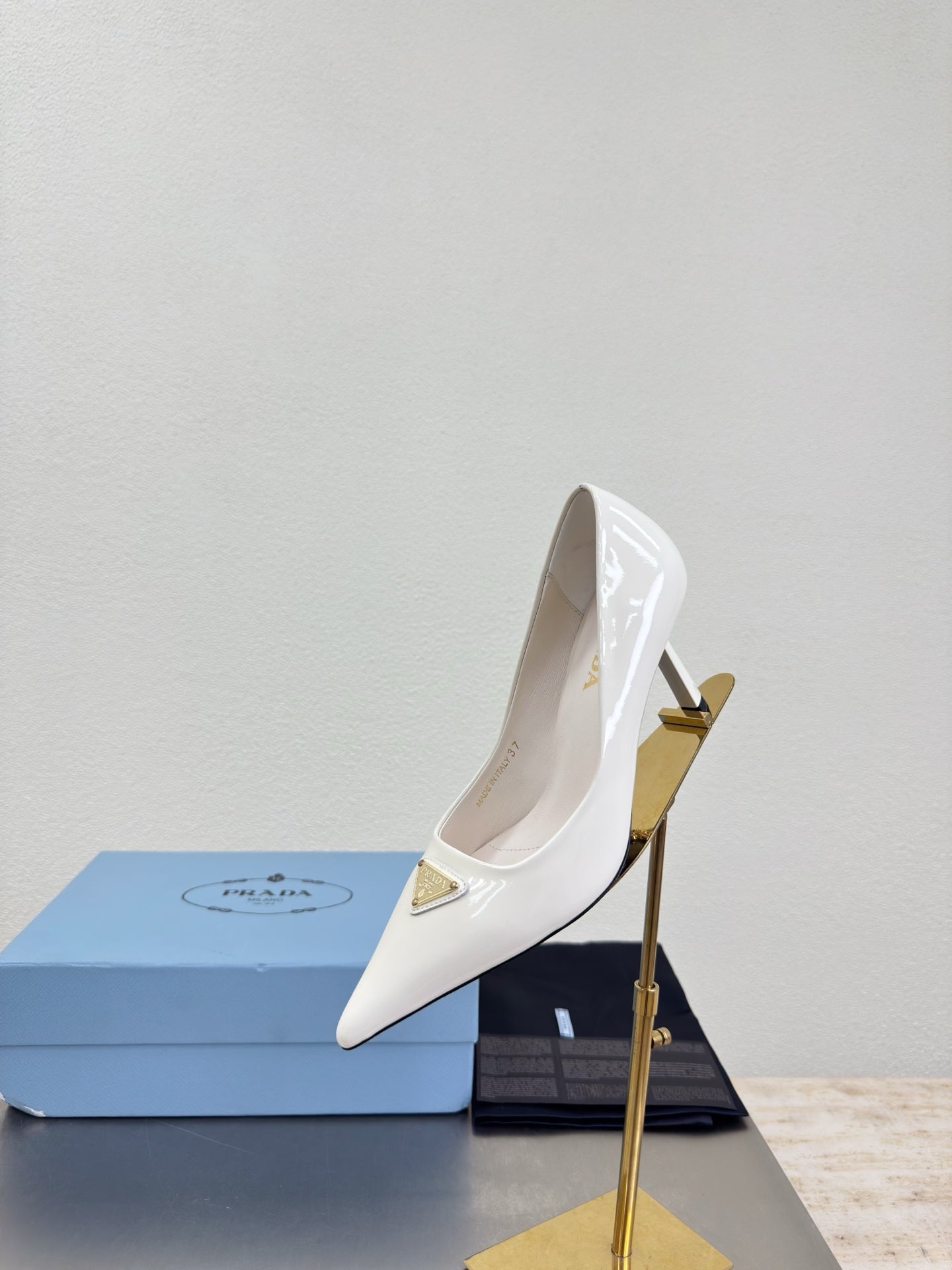 PRADA 26S POINTED TOE PUMPS 75MM IN WHITE PATENT CALFSKIN