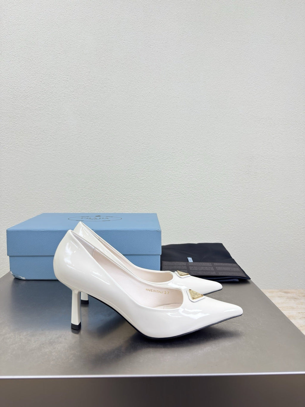 PRADA 26S POINTED TOE PUMPS 75MM IN WHITE PATENT CALFSKIN