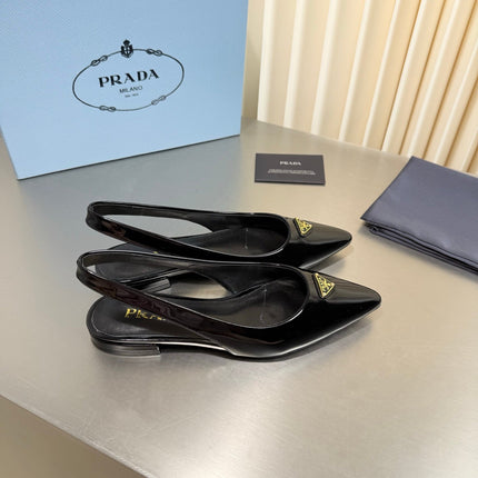 PRADA 26S SLINGBACK FLATS IN BLACK PATENT CALFSKIN WITH GOLD HARDWARE
