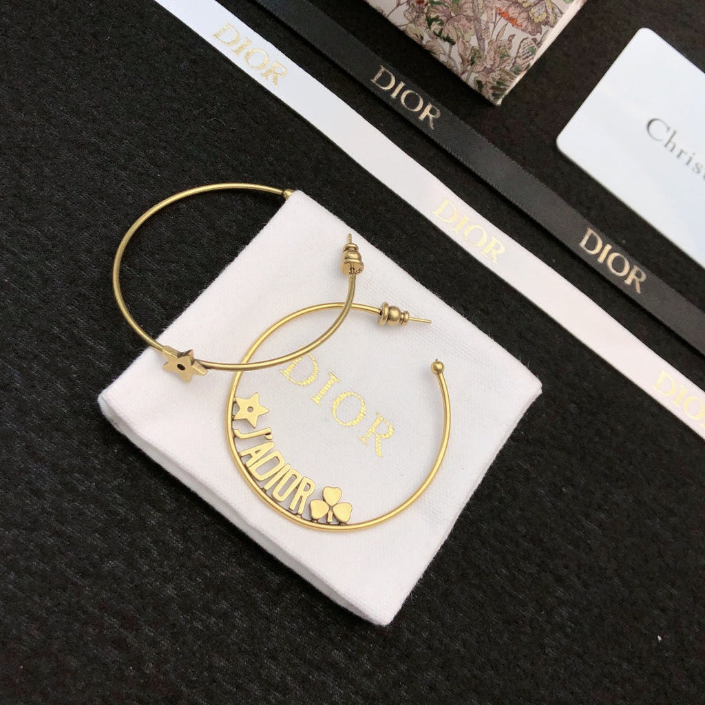 CD 26S STAR HOOP EARRINGS IN GOLD TONE METAL 644456