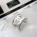 DOUBLE C BRACELET IN GOLD METAL RESIN LOGO