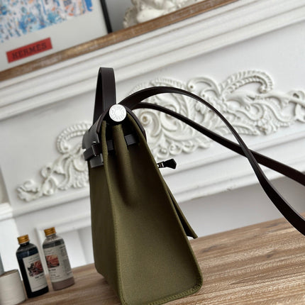 ZIP CABINE 31 BAG IN OLIVE GREEN CANVAS AND BLACK CALFSKIN