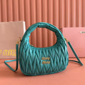 WANDER MATELASSÉ HANDBAG 23 IN LAGOON BLUE LAMBSKIN