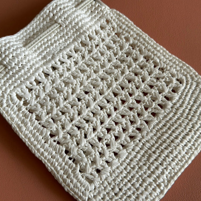 WANDER BUCKET BAG 23 WHITE IN RAFFIA WITH LEATHER TRIM