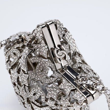 CHANEL 26S STAR CLUTCH MINI 13 IN SILVER CRYSTAL EMBELLISHED METAL