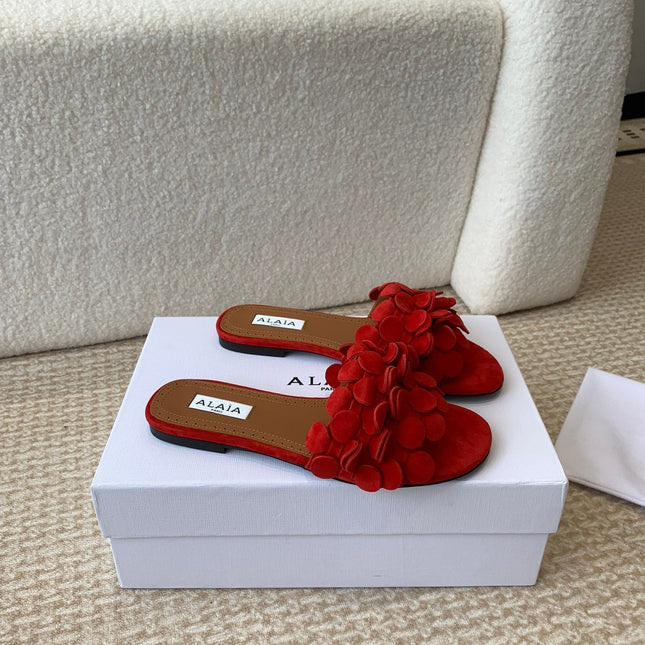 ALAIA FLAT MULE IN CHERRY RED SUEDE