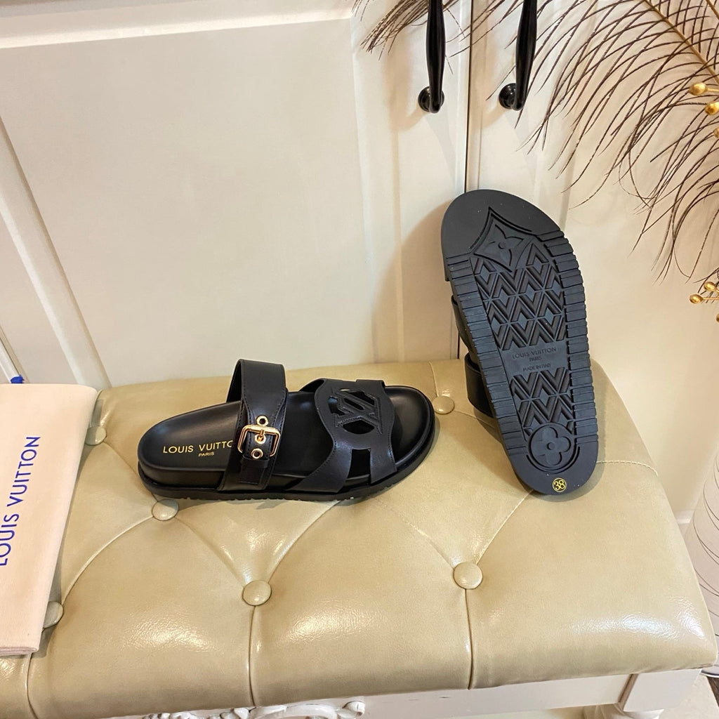 LV 26S ISOLA COMFORT MULES IN BLACK CALFSKIN