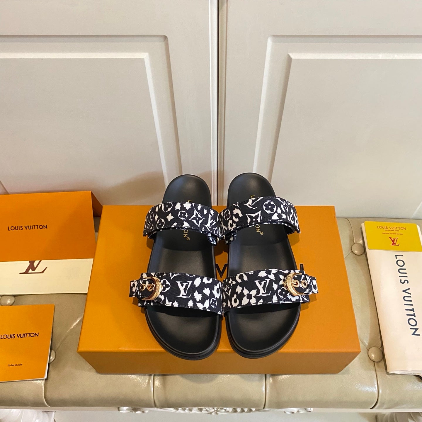LV 26S DOUBLE-STRAP PILLOW MULES IN WHITE AND BLACK CANVAS