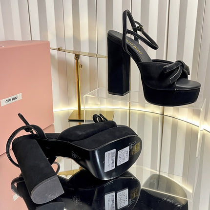 MIUMIU 26S PLATFORM ANKLE STRAP SANDALS 120MM IN BLACK SUEDE WITH BOW
