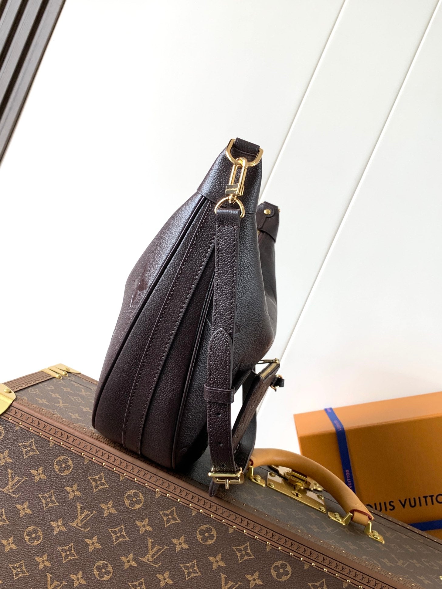 LOOP HOBO 38 IN DARK BROWN MONOGRAM CALFSKIN EMBOSSED LOGO