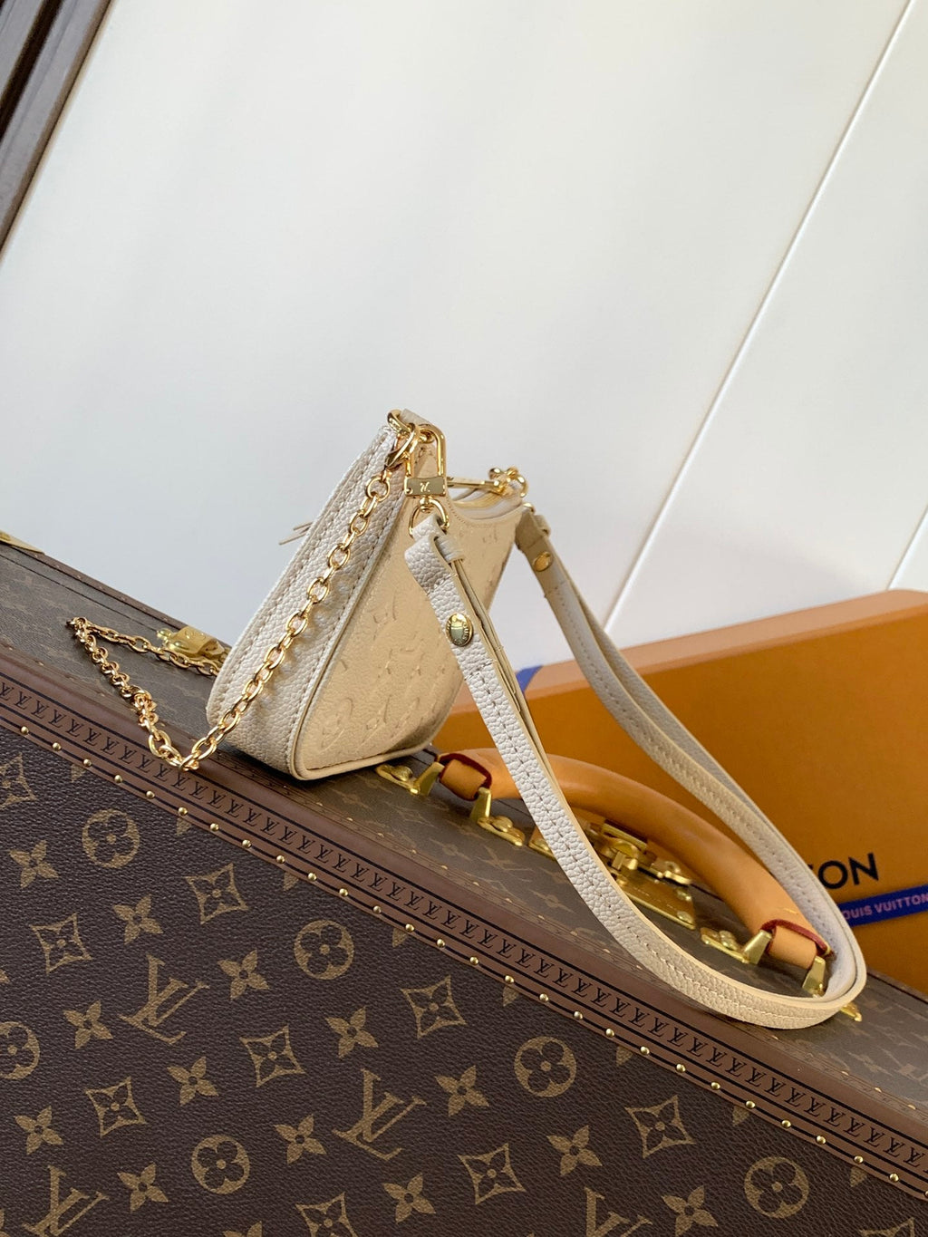 EASY POUCH ON STRAP 19 IN BEIGE MONOGRAM EMPREINTE LEATHER