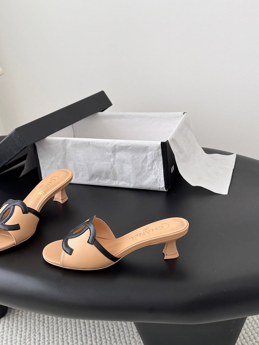 CHANEL HIGH MULES IN BEIGE MIX BLACK CALFSKIN