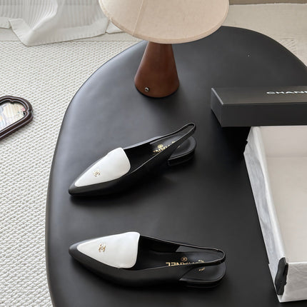 CHANEL 26S SLINGBACK FLAT IN BLACK AND WHITE CALFSKIN WITH CC LOGO