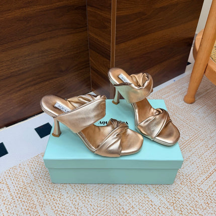 AQUAZZURA 26S TWISTED HEEL SANDALS 85 MM IN SOFT GOLD LAMBSKIN