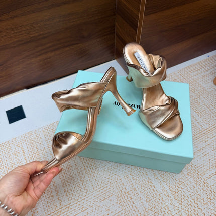 AQUAZZURA 26S TWISTED HEEL SANDALS 85 MM IN SOFT GOLD LAMBSKIN