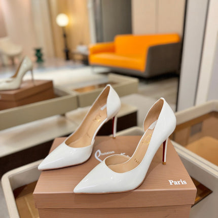 CHRISTIAN LOUBOUTIN 26S CUTOUT SIDE PUMP HEELS 105 MM IN WHITE PATENT CALFSKIN