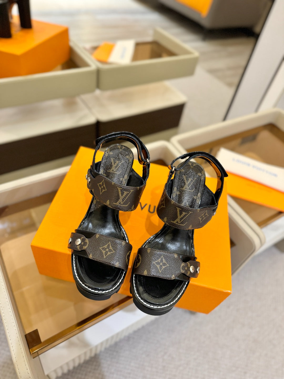 LV 26S HIGH HEEL SANDALS 100 MM IN DARK BROWN AND BLACK CALFSKIN