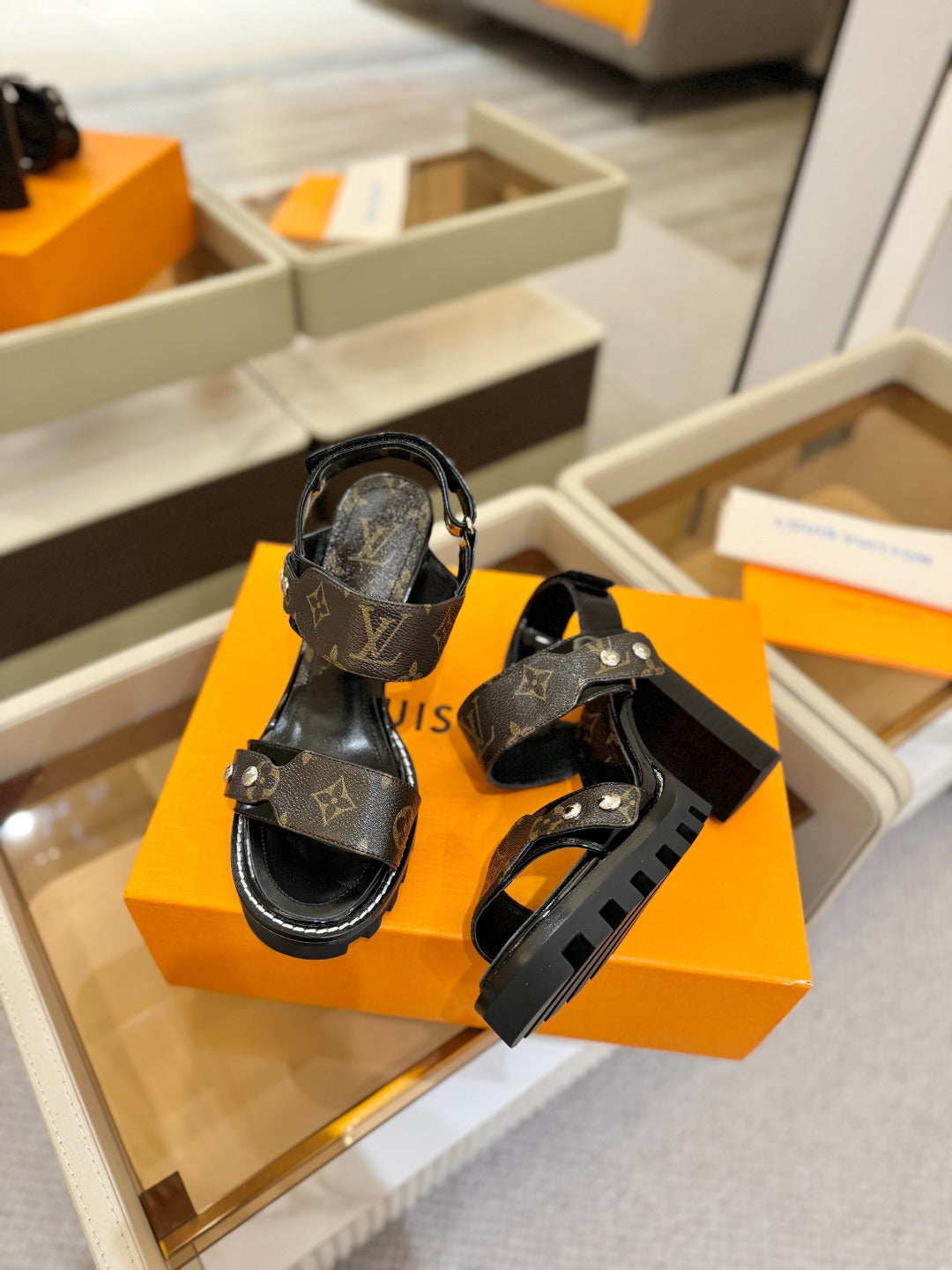 LV 26S HIGH HEEL SANDALS 100 MM IN DARK BROWN AND BLACK CALFSKIN