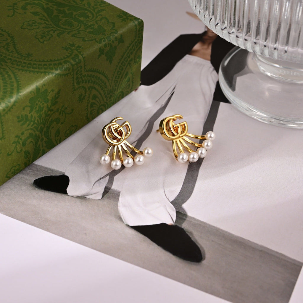 GUCCI 26S DOUBLE G LOGO PEARL FAN DROP EARRINGS IN GOLD TONE METAL 633779