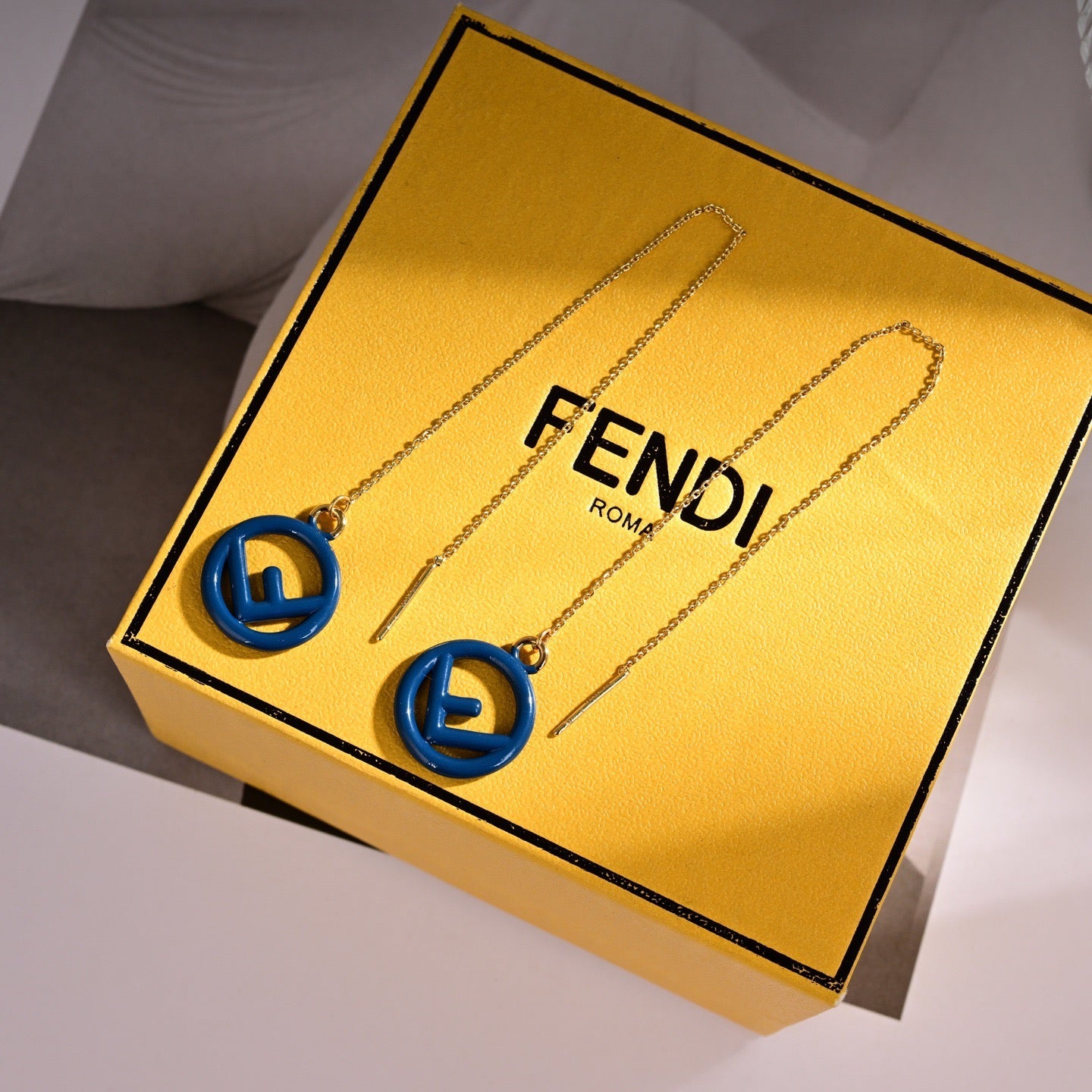 FENDI 26S FF LOGO THREADER EARRINGS IN NAVY BLUE RESIN AND GOLD TONE METAL 634941