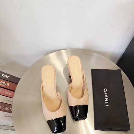 MULES IN BLACK AND BEIGE SUEDE