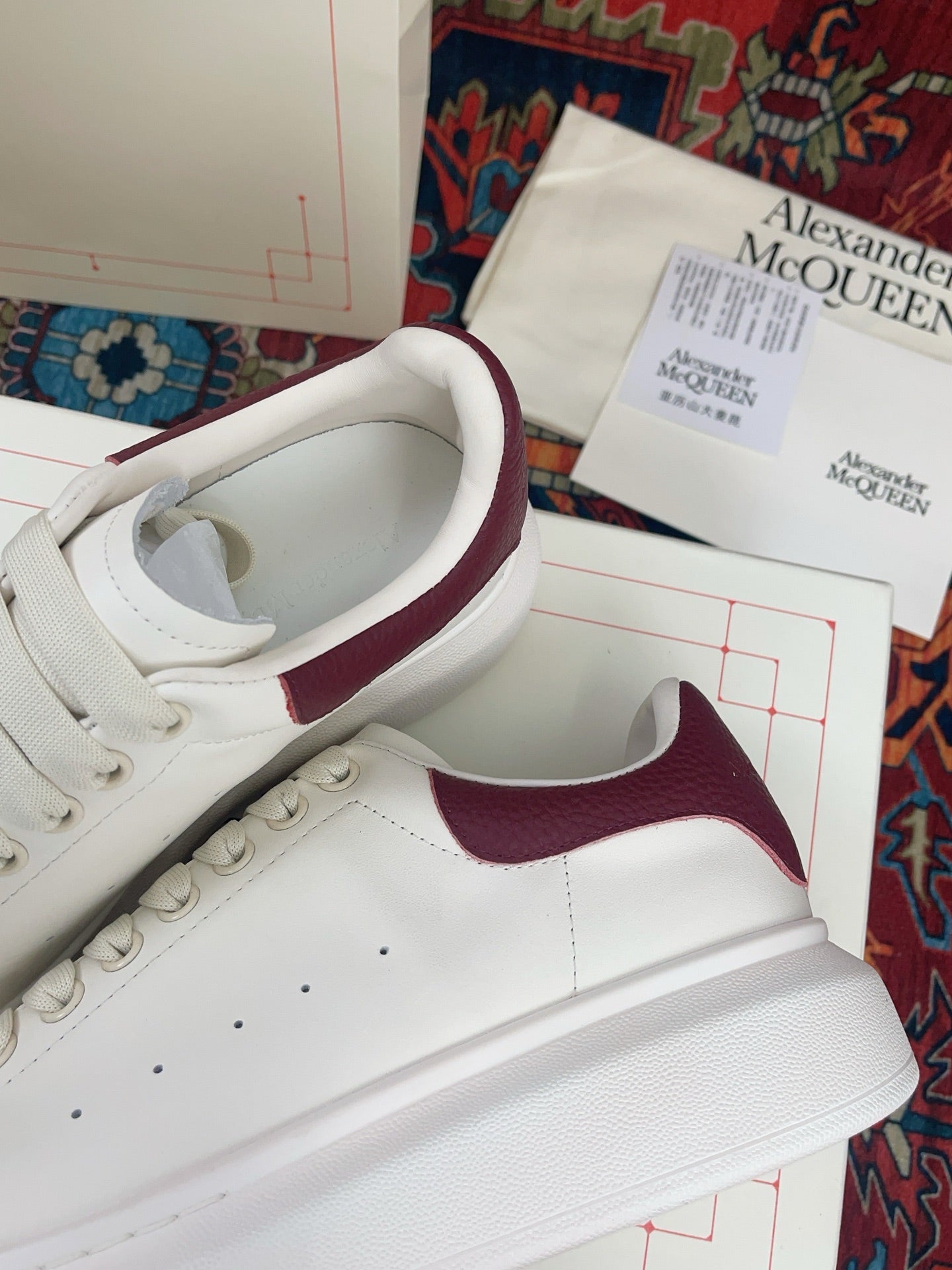 OVERSIZED SNEAKER IN WHITE CALFSKIN BURGUNDY EMBOSSED HEEL TAB