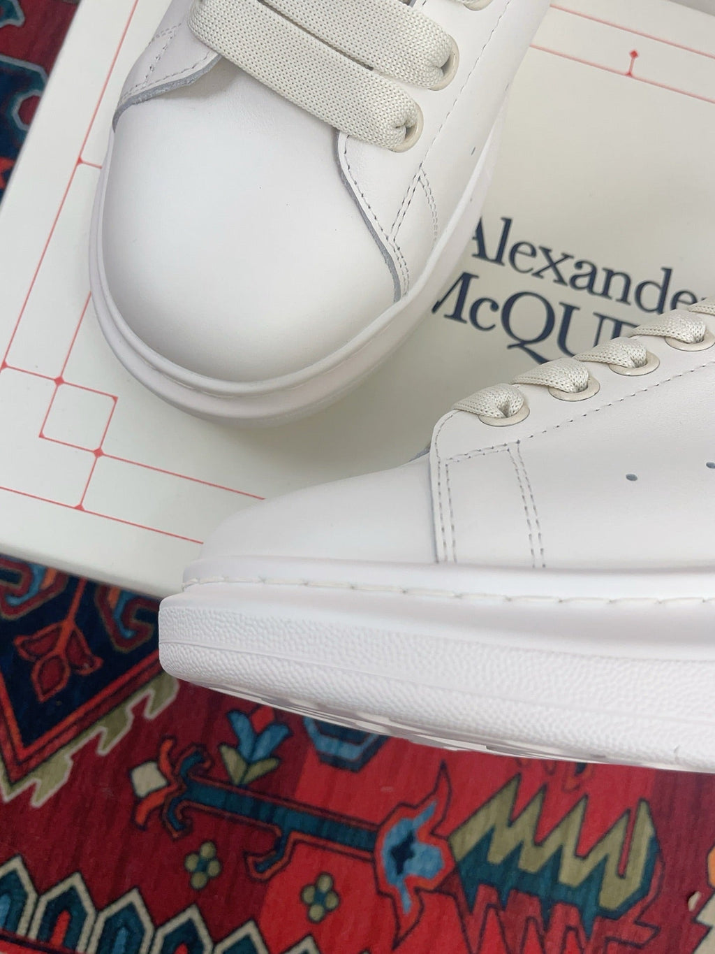 OVERSIZED SNEAKER IN WHITE CALFSKIN BURGUNDY EMBOSSED HEEL TAB