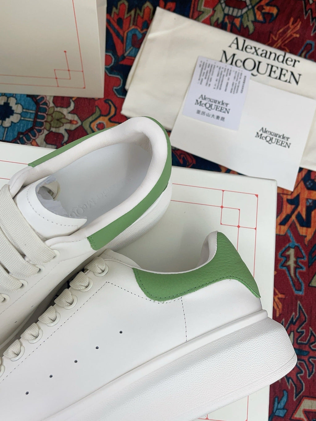 OVERSIZED SNEAKER IN WHITE CALFSKIN WITH EMBOSSED HUNTER GREEN HEEL TAB