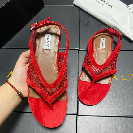 ALAIA 26S FLAT MESH THONG SANDALS IN RED SUEDE