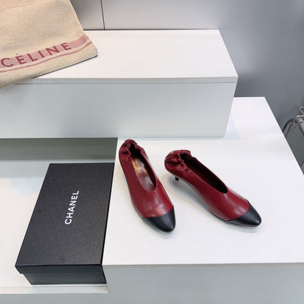 CHANEL 26S COLOR-BLOCK HIGH HEELS 45 MM IN RED AND BLACK LAMBSKIN