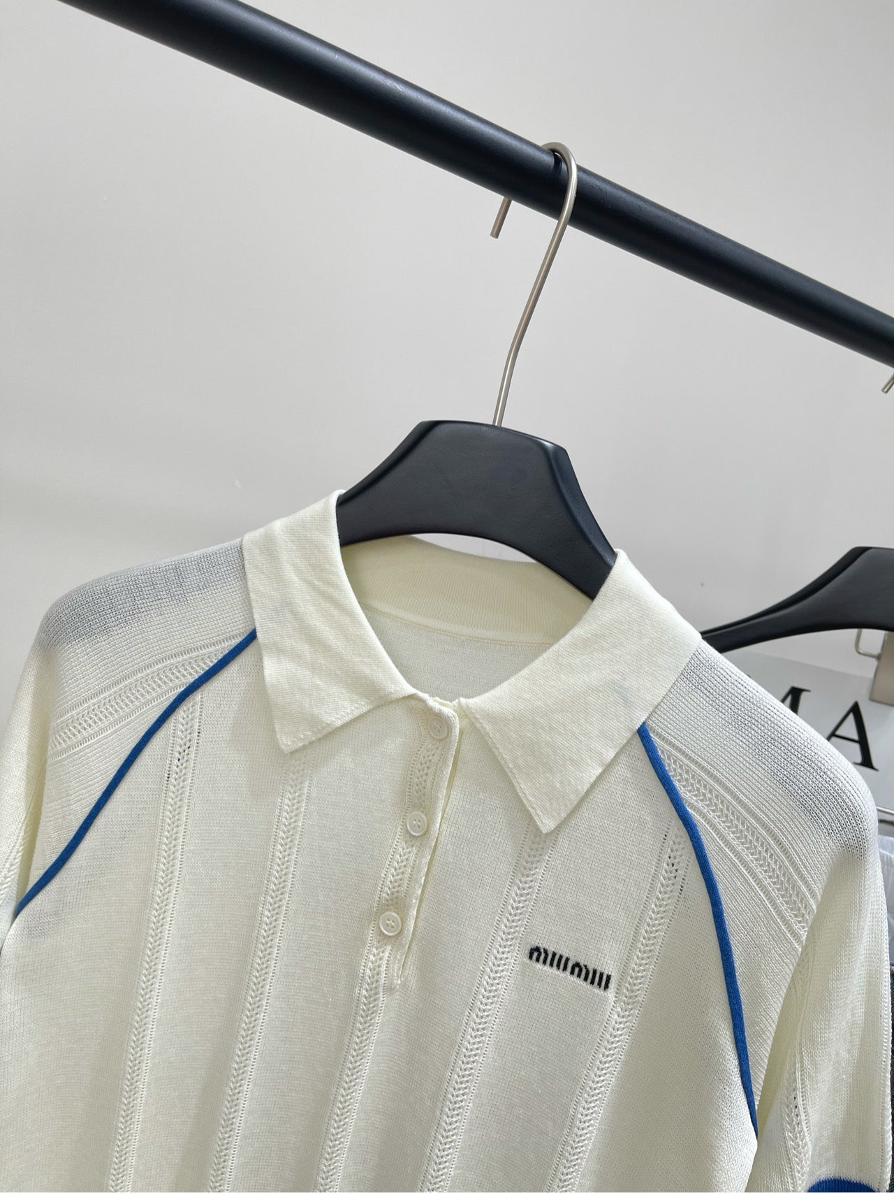 MIUMIU SHORT-SLEEVE RAGLAN POLO SHIRT IN BLUE AND WHITE 267966