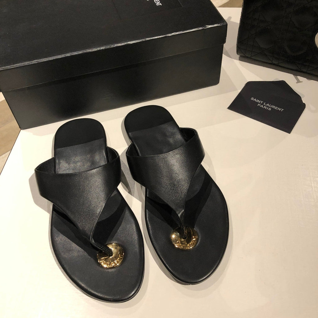 FLAT THONG IN BLACK CALFSKIN